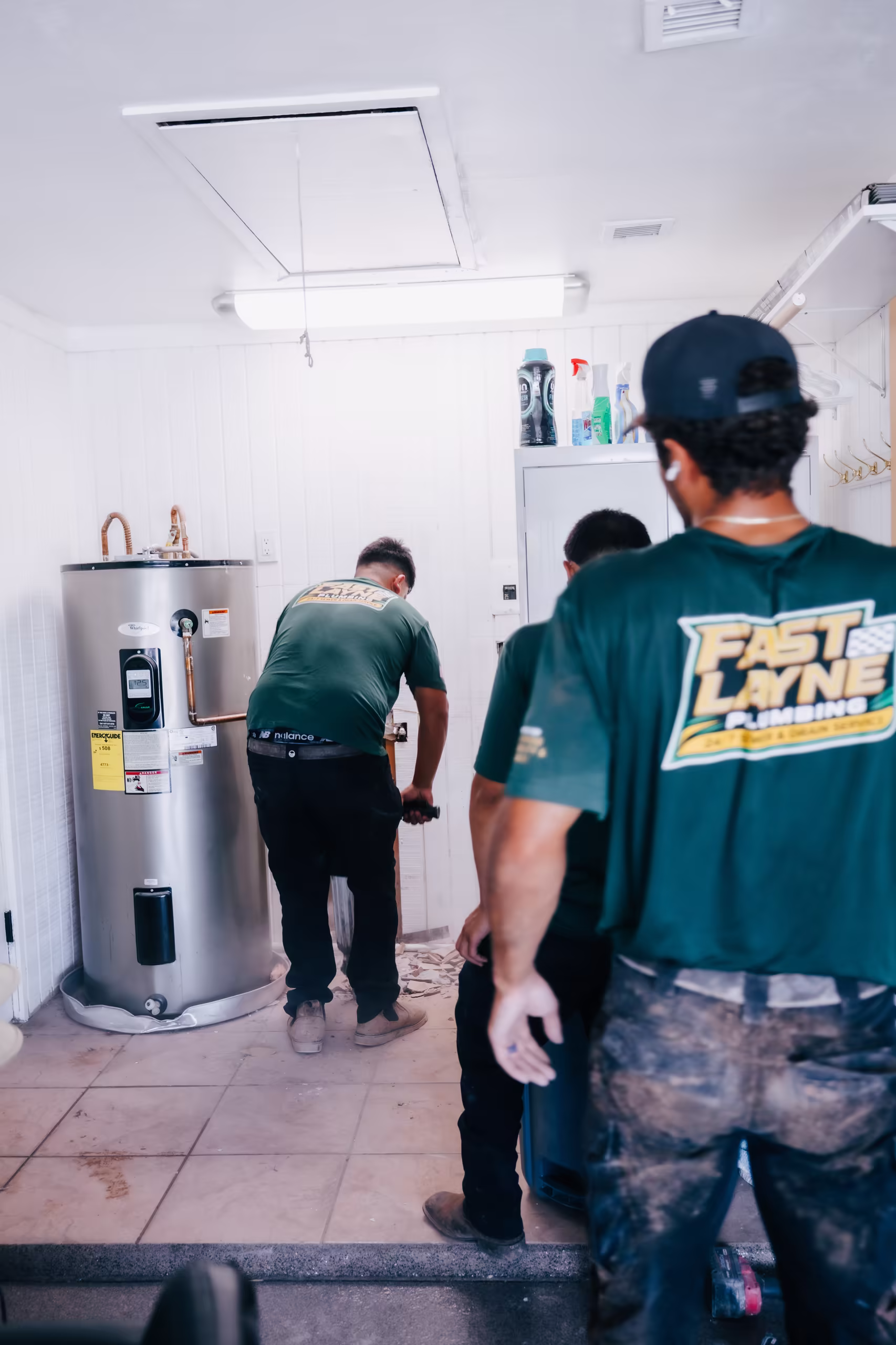 Fast Layne plumber installing a new water heater